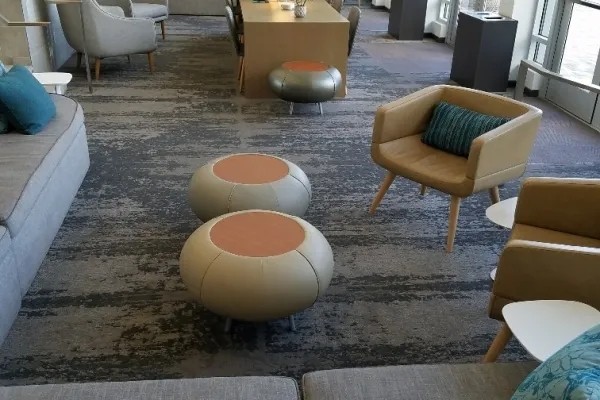Biophilic commercial flooring design in Scottsdale hotel - natural materials and warm tones by ABS Floor Covering